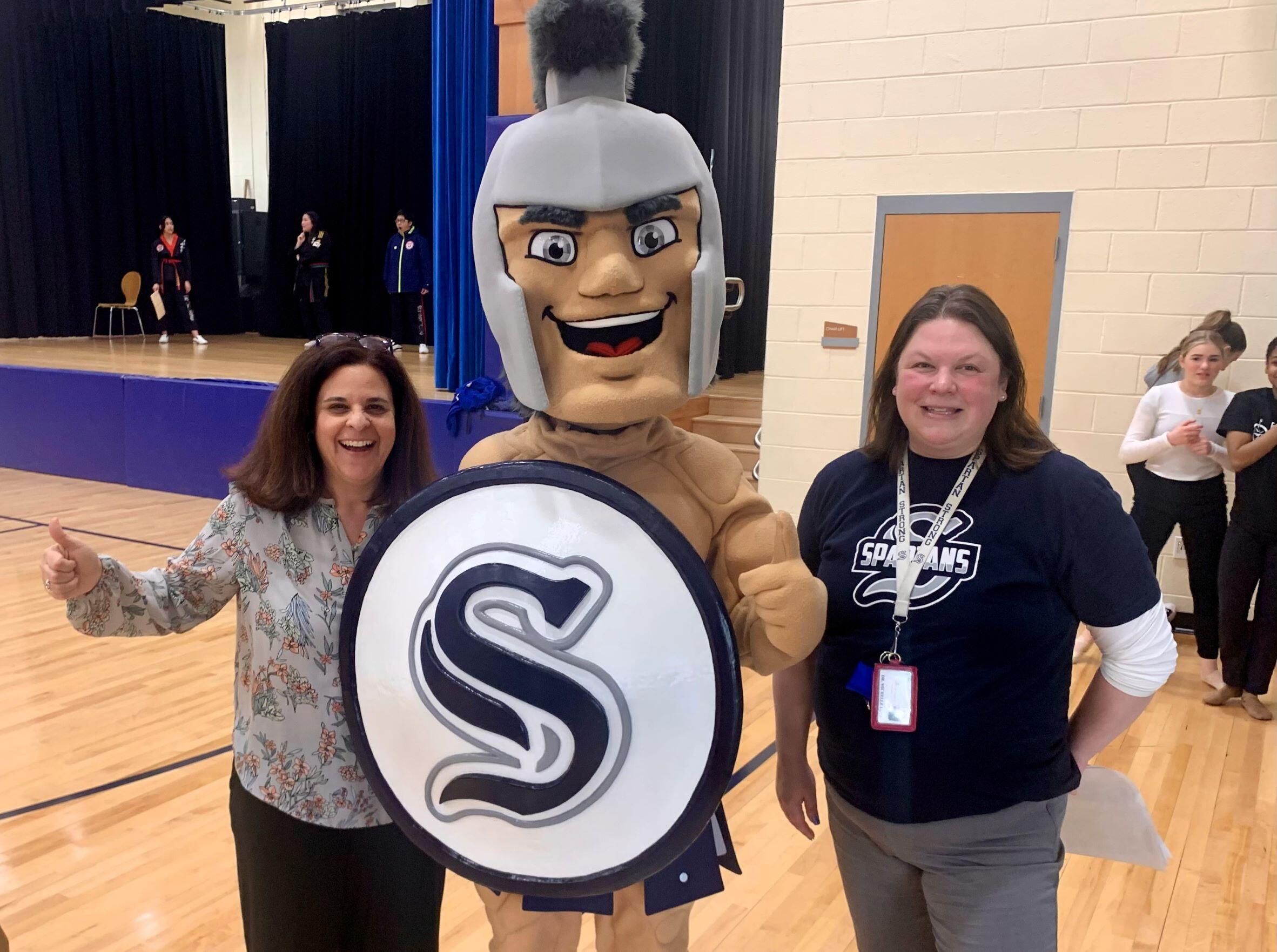 Enf- Dr. Yannacone and Dr. Lutz standing with the Spartan Mascot
