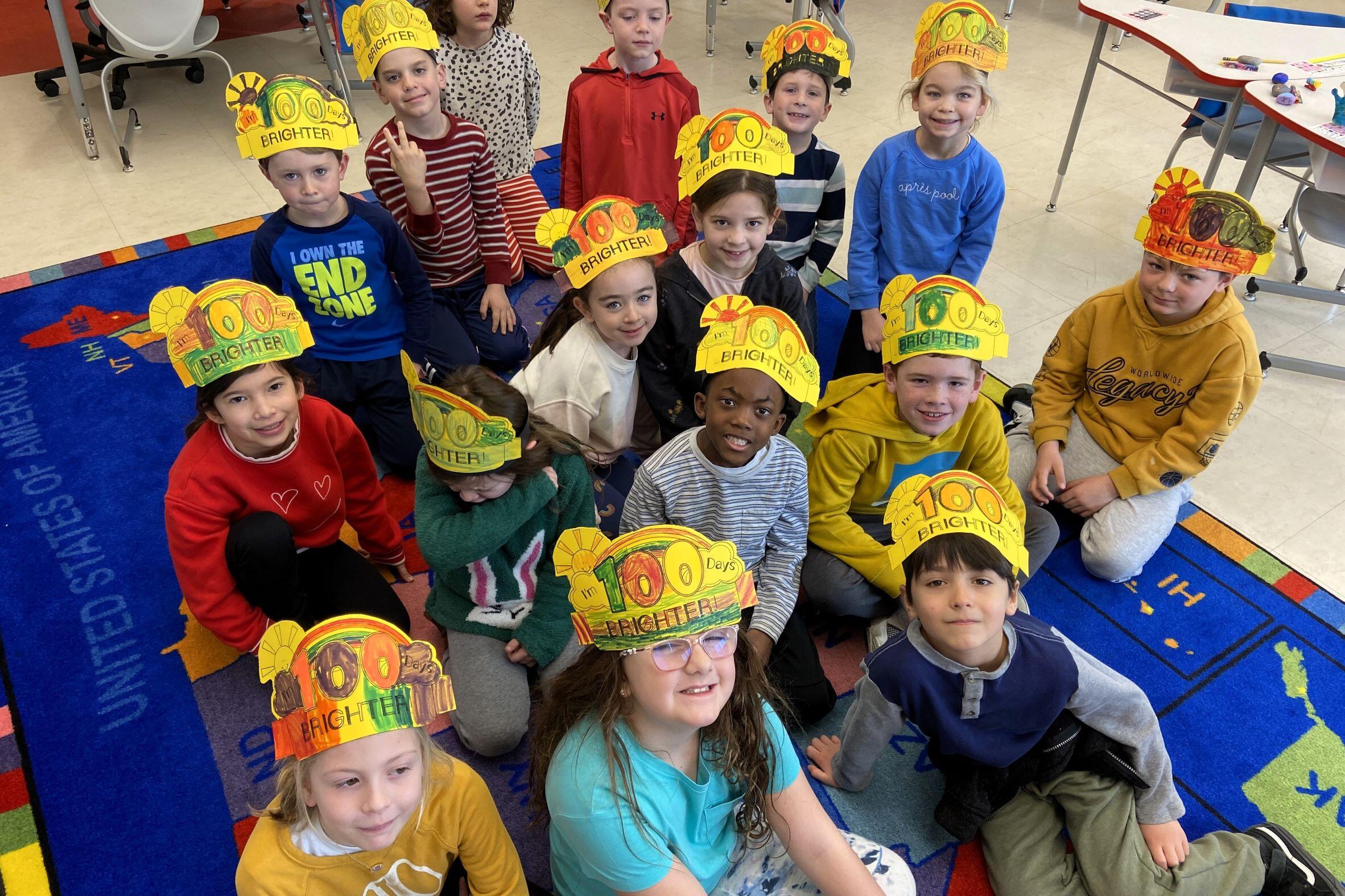 Enf- Students wearing 100th day hats